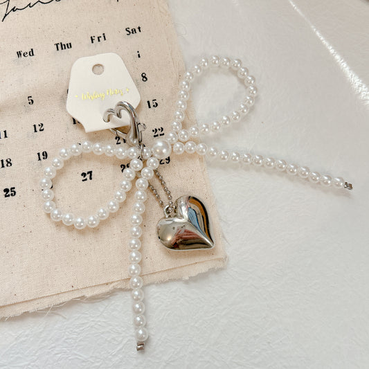 Bow beaded bag charm